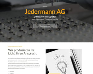Startseite der Jedermann AG Schriftzug über einem Lichtsteuergerät