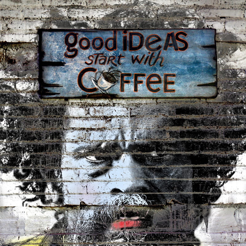 Street-Art-Porträt unter einem Schild mit der Aufschrift „Good ideas start with coffee“ als Symbol für Kreativität und eigenständige Ideen